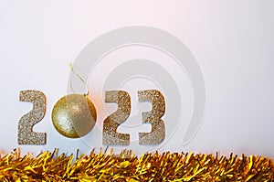 Happy New Year 2023. Golden numbers Christmas white background