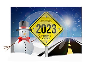 Happy new year 2023 greetings with road sign on the background of the road going into the distance planning concept and goals