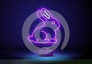 Happy new year 2023 in neon style. Bunny icon in neon style. Hare or rabbit minimal concept. 2023 year of the rabbit