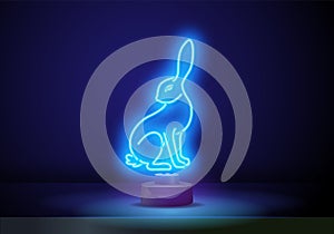 Happy new year 2023 in neon style. Bunny icon in neon style. Hare or rabbit minimal concept. 2023 year of the rabbit
