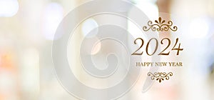 Happy New Year 2024 on blur abstract bokeh background with copy space for text, new year greeting card, banner