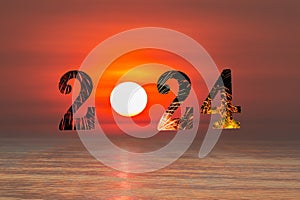 Happy New Year 2024 concept image with text over sea .