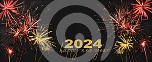 HAPPY NEW YEAR 2024 - Festive silvester New Year`s Eve Party background panorama greeting card banner long - Golden red fireworks