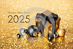 Happy New Year 2024! Golden gift box and christmas balls on golden background