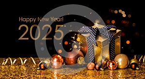 Happy New Year 2024! Golden gift box and christmas balls on golden background