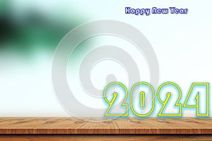 Happy new year 2024 ,Wood table top on blurred of sky blue background with coconut leaf