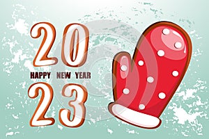 Happy New Year background.Christmas gingerbread in the form of the number 2023. Ginger cookies in the form of mittens.