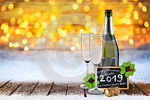 Happy new year bokeh champagne greetings golden warm background