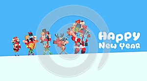 Happy New Year Card With Elves, Reindeer And Santa Carrying Gift Boxes Stack Christmas Holiday Presents Concept