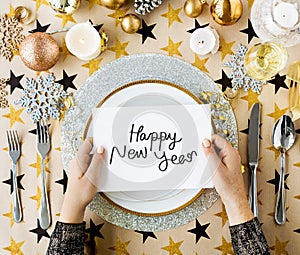 Happy New Year card and festive table settings