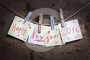 Happy New Year card on wooden background