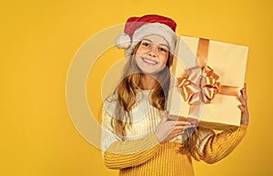 happy new year. christmas shopping online. time for discount. smiling kid hold purchase. presents and gifts from santa