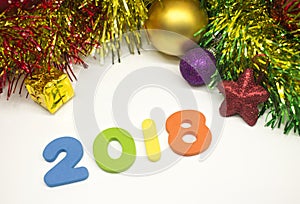 Happy New Year 2018 colourful tinsel Christmas decoration background