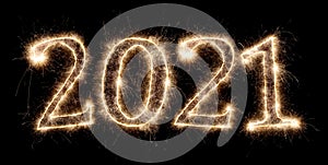 2021 happy new year eve bright glowing golden pyrotechnics sparkler fireworks number isolated black background