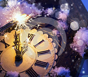 Happy new year eve celebration with old clock and fireworks