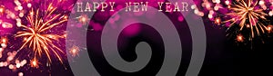 Happy new Year fireworks background banner panorama greeting card - Colorful abstract  firework with pink bokeh lights in the dark