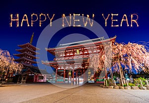 Happy New Year fireworks over Asakusa temple at night in Tokyo, Japan