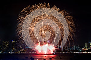 Happy new year fireworks over cityscape at night.holiday celebration festival