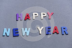 Happy new year font art colorful texting for greeting or celebrate card with gray background,