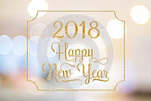 Happy New year 2018 gold sparkling glitter word with golden frame at abstract blurred bokeh light background, Holiday concept