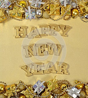 Happy New Year golden text and Christmas decorations