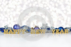 Happy New Year golden text and Christmas decorations