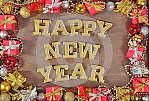 Happy New Year golden text and Christmas decorations