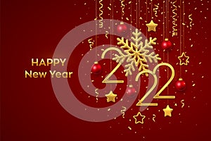 Happy New 2022 Year. Hanging Golden metallic numbers 2022 with shining snowflake and confetti on red background. New Year greeting