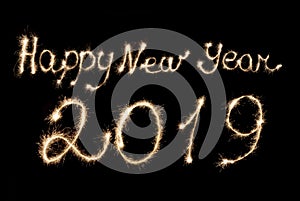 Happy New Year 2019 inscription sparklers .