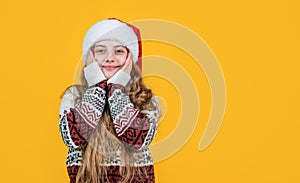 happy new year. merry christmas. cheerful teen girl celebrate xmas party. kid wear red santa claus hat. child santa