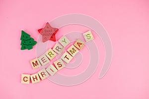 Happy New Year and Merry Christmas. Scrabble letters, playdough and plasticine. Letter tiles spelling celebration holiday