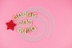 Happy New Year and Merry Christmas. Scrabble letters, playdough and plasticine. Letter tiles spelling celebration holiday