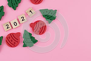 Happy New Year and Merry Christmas. Scrabble letters, playdough and plasticine. Letter tiles spelling celebration holiday