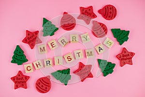 Happy New Year and Merry Christmas. Scrabble letters, playdough and plasticine. Letter tiles spelling celebration holiday
