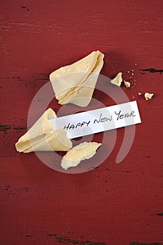 Happy New Year message greeting inside Chinese New Year fortune cookie