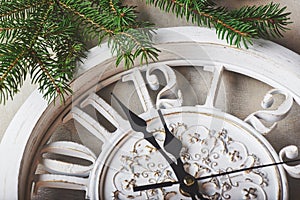 Happy New Year at midnight 2018, Old wooden clock and fir branches