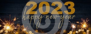 HAPPY NEW YEAR / NEW YEAR`S EVE 2023 background greeting card - Frame of lights bokeh golden flares and sparkler isolated on