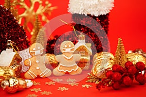 Happy New Year`s 2022, Christmas set of gingerbread man and woman in face mask and red gold decorations on classic traditional re