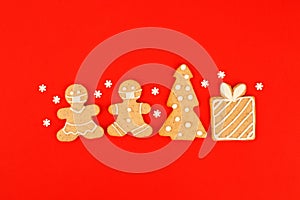 Happy New Year`s 2022 set of gingerbread man in face mask from ginger biscuits glazed sugar icing decoration on classic