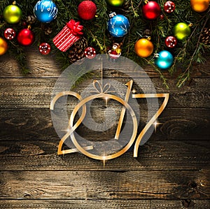 2017 Happy New Year seasonal background with Christmas baubles