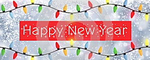 Happy New Year - A snowflake background banner with multiple colour Christmas Tree lights