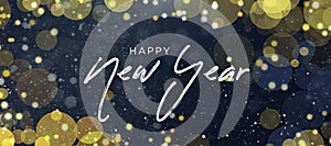 Happy New Year Text Design Over Gold Abstract Defocused Bokeh Lights and Glitter Background, New Years Greeting Card