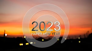 2023 Happy New Year Text on Night City with Bokeh Background