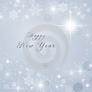 Happy New Year text written on grey bright sparkly winter background. New Year card