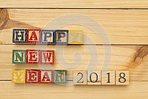 Happy new year 2018 wood cubes on wooden table cool