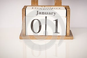 Happy New Year: Wooden block calendar showing 1st January