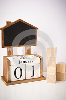 Happy New Year: Wooden block calendar showing 1st January