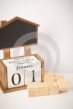 Happy New Year: Wooden block calendar showing 1st January