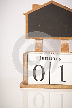 Happy New Year: Wooden block calendar showing 1st January