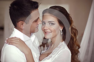 Happy newlywed couple wedding portrait. Beautiful bride and hand